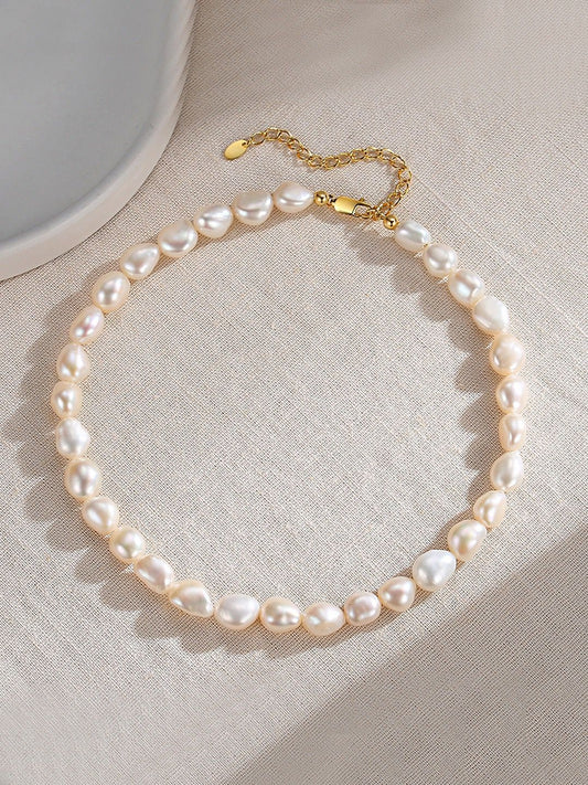 Classic freshwater pearl necklace on white background