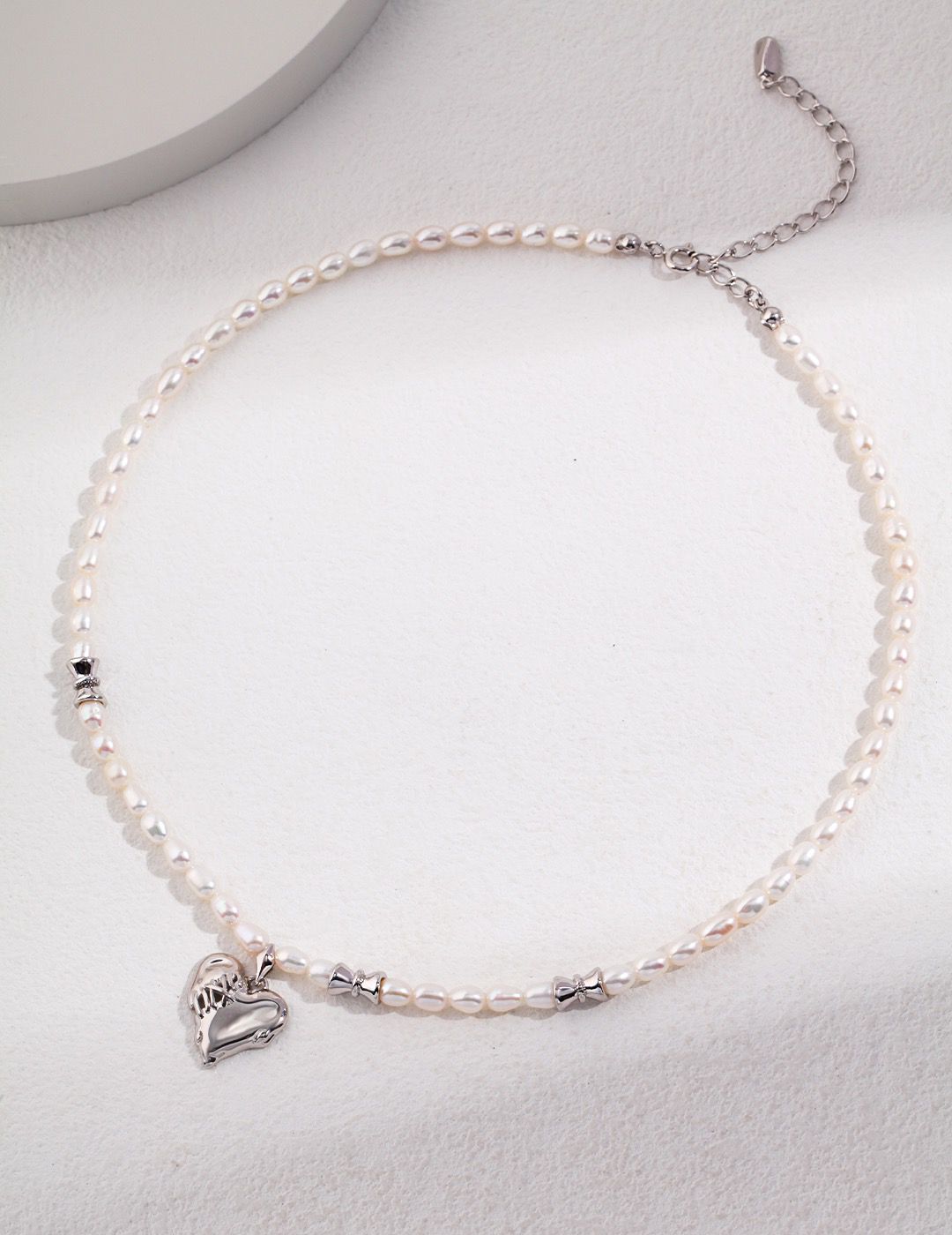 Silver heart necklace with freshwater pearls