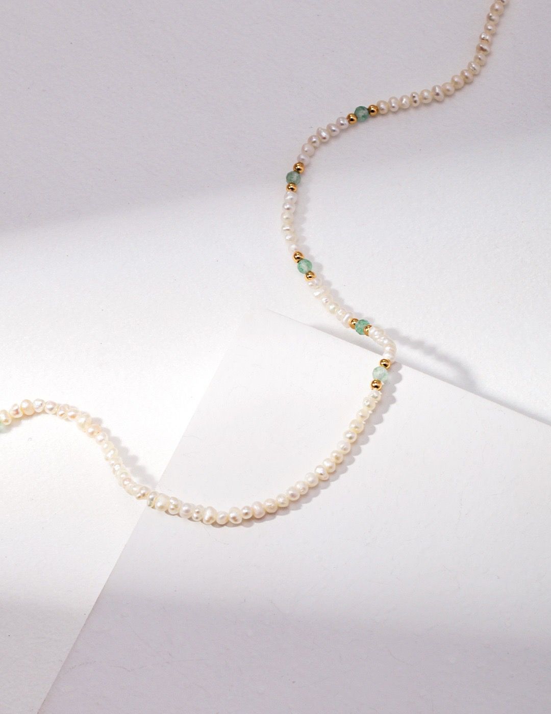 Beachy Beaded Pearl and Quartz Necklace on a white background