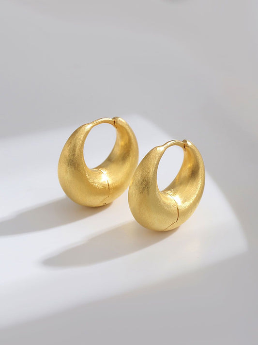 Golden Hoop Earrings - Timeless and elegant fashion accessories for women. Lightweight with secure latch back closure. Perfect for any occasion.