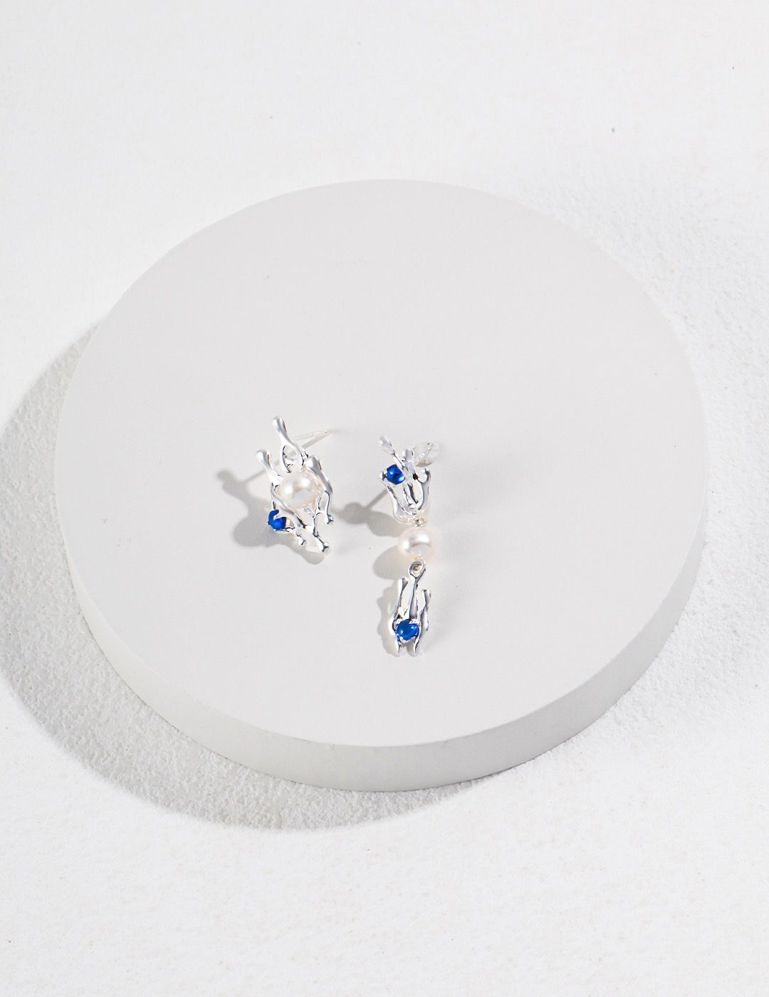 Elevate your style with our Sapphire and Silver Teardrop Earrings. Crafted from high-quality sterling silver and featuring brilliant sapphire gemstones, these earrings offer a timeless elegance that complements any outfit.
