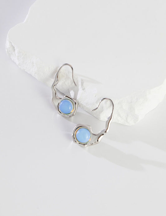 Elevate your style with our Natural Agate Drop Earrings, crafted with high-quality natural agate stones in a unique drop design. Promoting emotional stability and inner peace, these earrings are perfect for any occasion. Shop now for a one-of-a-kind piece of jewelry that truly enhances your look.