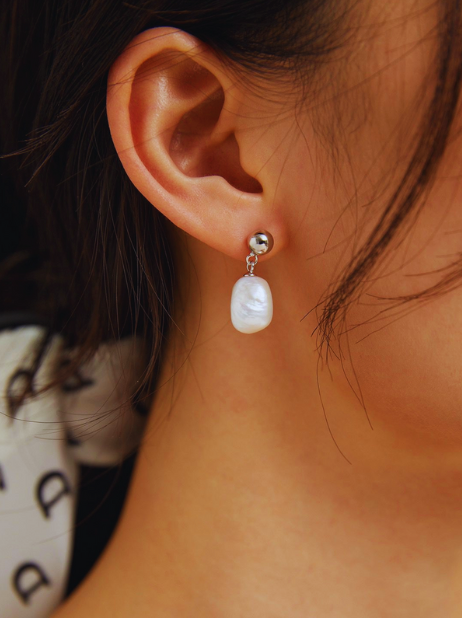 Our Organic Pearl Earrings feature naturally formed freshwater pearls and are handcrafted by skilled artisans. The earrings are hypoallergenic and a sustainable option for those looking for eco-friendly jewelry.